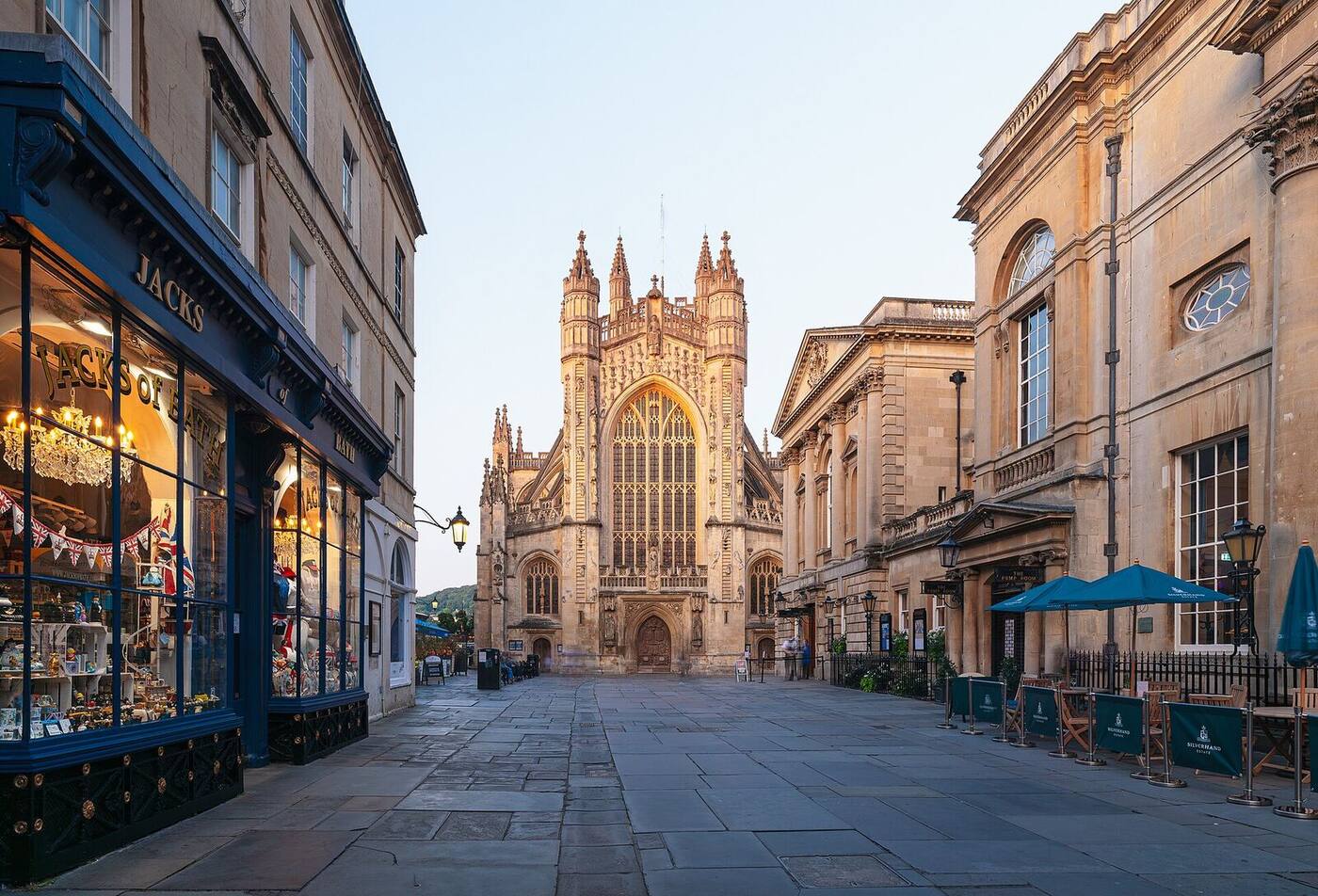 The west front of Bath Abbey with its carved angels climbing stone ladders